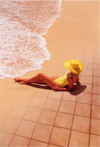 Woman on beach and warm tile floor.